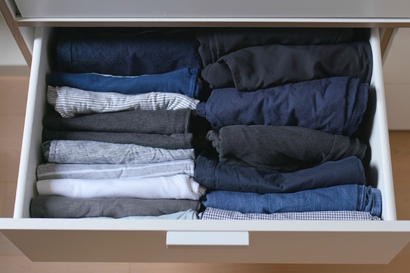 folded clothes in drawer