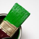 green paint and brush
