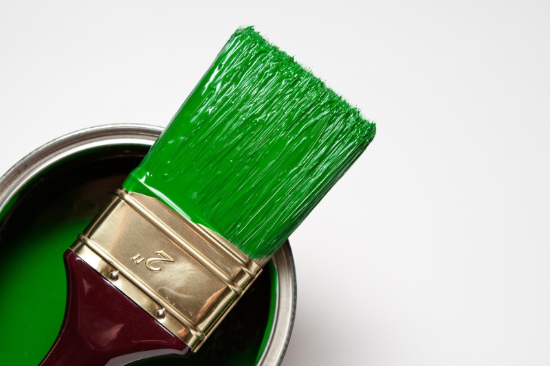 green paint and brush