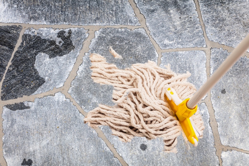 mopping stone floor