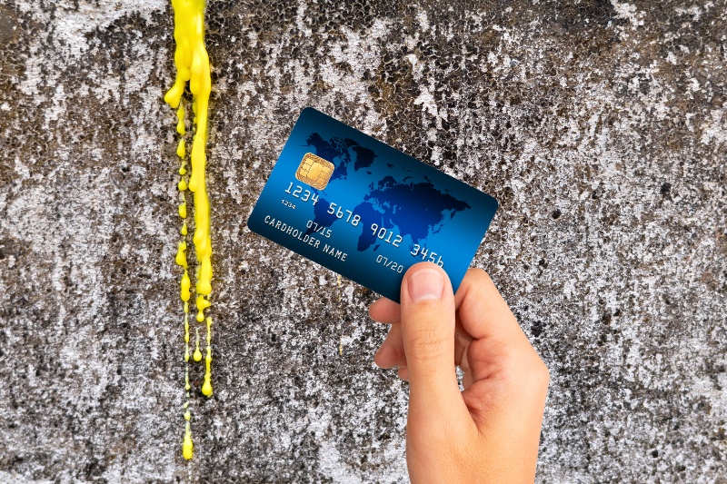 scrape wax off wall with credit card