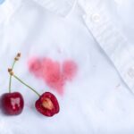 cherry juice stain on white polo shirt