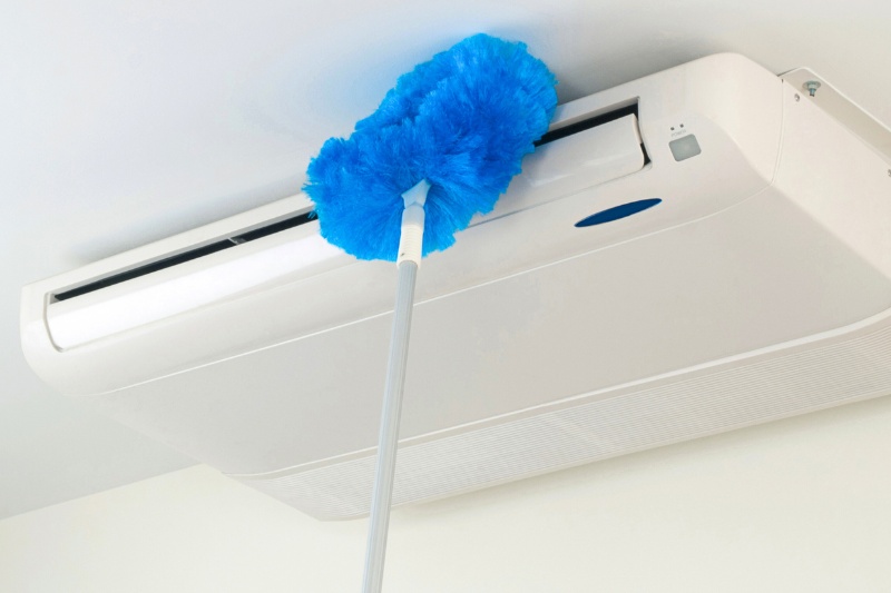clean aircon or ceiling with long duster