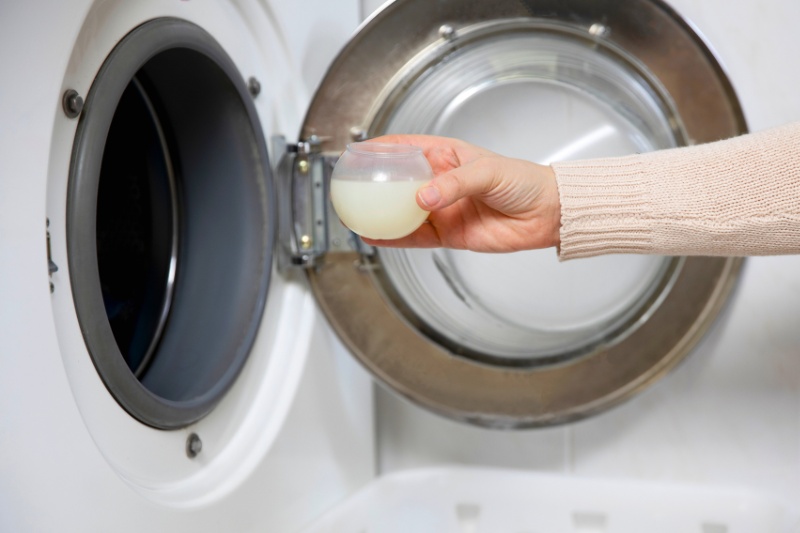 liquid laundry detergent in washing machine drum