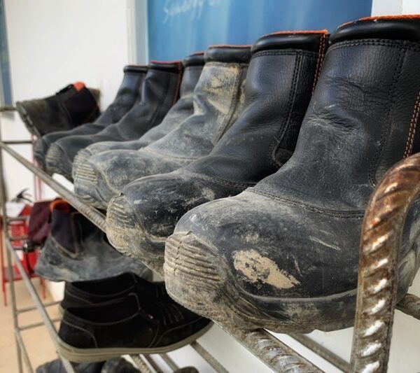 Muddy boots drying