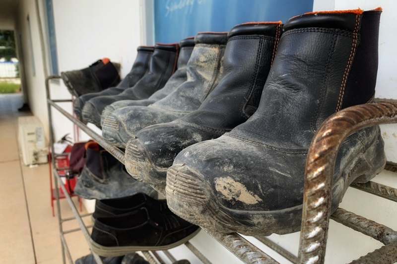 Muddy boots drying