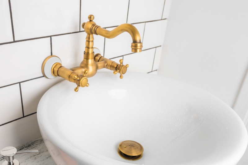 a brushed brass tap