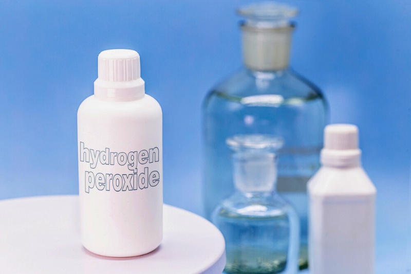 hydrogen peroxide in white bottle