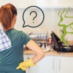 woman wondering why sink is smelly