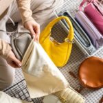 How to Store Clothes in the Loft Sorting clothes for storage