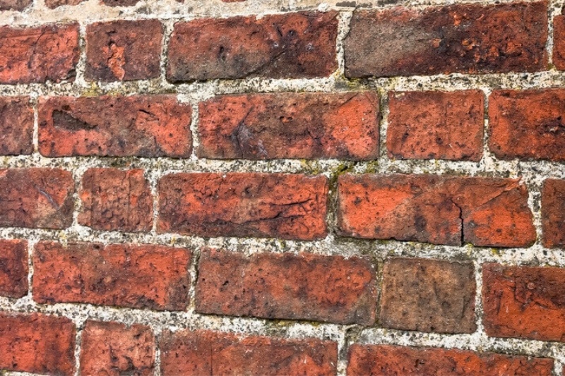 dirty outside brick wall