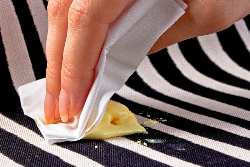 wiping fresh yoghurt stains on fabric